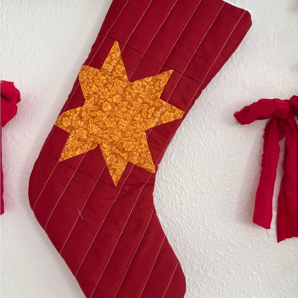 Festive Red Holiday Stocking with Gold Star